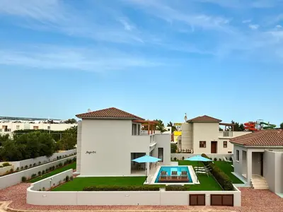 a view of a house with a swimming pool at Angie Luxury Beach Villas in Ayia Napa