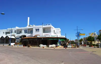 a building on the side of a street at Millie's Apartments in Ayia Napa