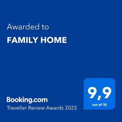 a blue house with the text awarded to family home at FAMILY HOME in Protaras