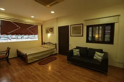 a living room with a couch and a bed at Nicosia Luxury Studio in Nicosia