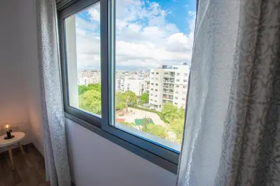 a window with a view of a city at Glabur Stays - The Nicosia Elite - Exceptional Top Floor Apartment Nicosia City, Welcomes U!!! in Nicosia