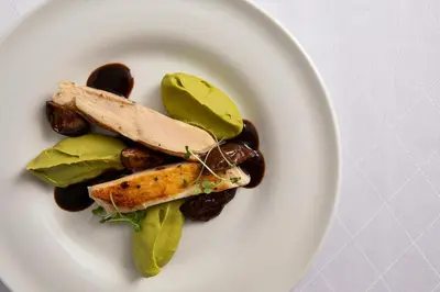 a plate of food with vegetables on a table at Sunrise Jade - Adults Only in Protaras