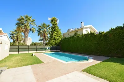 a swimming pool in the yard of a house at Villa Daryah Sirina Bay in Protaras