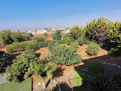 an overhead view of a garden with plants and trees at Orchard Blossom Private Villa With Pool in Phrenaros