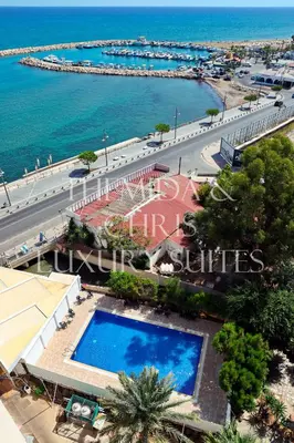 an overhead view of a city with a swimming pool at Front-Row - Skyline Retreat - Pool Access in Larnaka