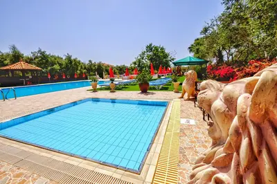 a swimming pool in a resort with a swimming pool at Hadjios Valley in Mazotos