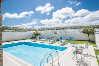 a swimming pool on the roof of a house at Villa Anemoni 8 in Protaras