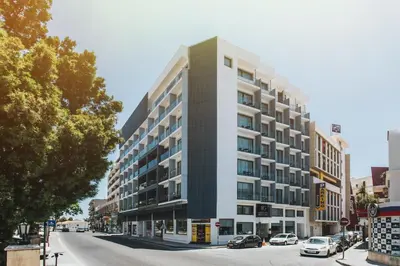 a rendering of a building on a city street at Frangiorgio Hotel in Larnaka