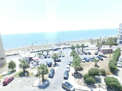 an aerial view of a parking lot next to the beach at ZORBAS No 3 in Larnaka