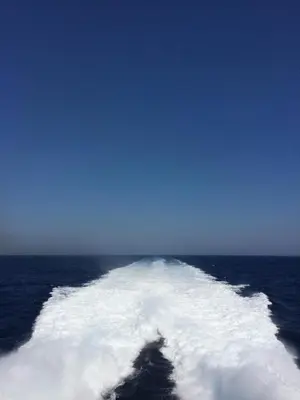 a wave in the ocean on a boat at Aphentrika Apartments in Protaras
