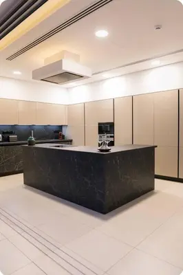 a kitchen with a black counter in a room at Seaview Luxury Villas Ayia Napa in Ayia Napa