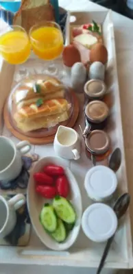 a tray of food with eggs and vegetables on a table at Ble Mavi - Studio for 2 in Vouni