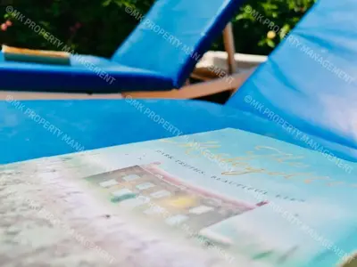 a book sitting on top of a table at Merika Complex 1 Hou.32 in Larnaka