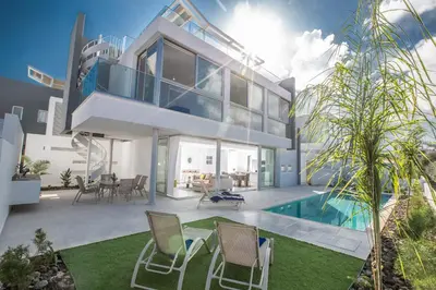 an image of a house with a swimming pool at Blue Pearl Villas in Protaras