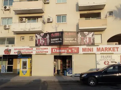 a car parked in front of a building at Lighthouse in Larnaka
