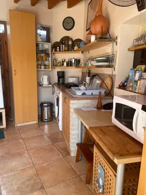 a kitchen with a counter and a microwave in it at Avli-the courtyard in Nicosia