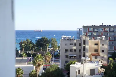 a view of the ocean from a building at Seaside Spacious Apartment with Sea View in Limassol
