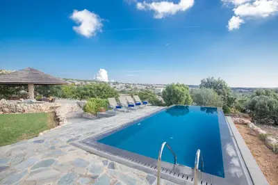a swimming pool in a villa with a view at Villa Othelo in Ayia Napa