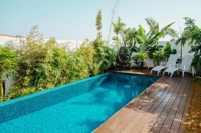a swimming pool on top of a house at Island Home Seaside Villa in Paralimni