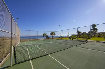 a tennis court with two tennis courts at Coralli A 305 in Protaras