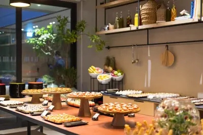 a buffet line with many different types of pies at Hotel Indigo Larnaca by IHG-ADULTS ONLY in Larnaka