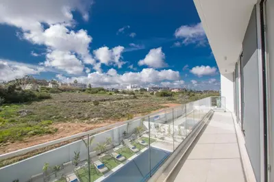 a balcony with a view of the desert at Olivine 3 Bedroom Villas in Protaras