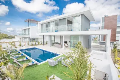 an image of a house with a swimming pool at Olivine 3 Bedroom Villas in Protaras