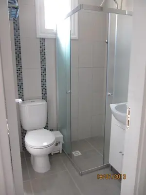 a bathroom with a toilet and a sink at Sunny Holiday Apartments in Protaras