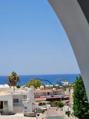 a view of the ocean from a building at Myriama Apartments in Ayia Napa