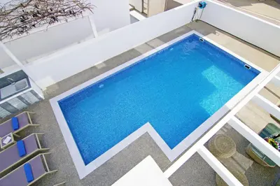 an overhead view of a swimming pool on top of a building at Villa Paradisia in Ayia Napa