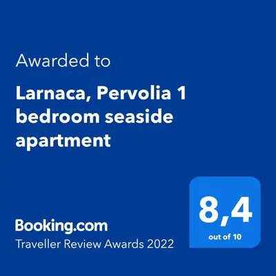 a screenshot of a phone with the text awarded to laaza peruana bedroom at Larnaca, Pervolia 1 bedroom seaside apartment in Pervolia