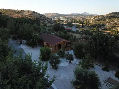 an aerial view of a house in a mountain at Happy Glamping Cy in Ayios Theodhoros