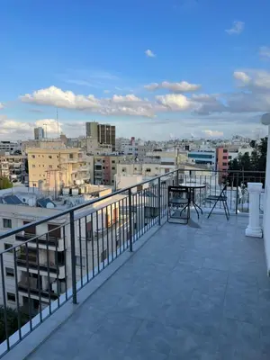 a balcony with a view of a city at Top floor apartment in Nicosia with view! in Nicosia