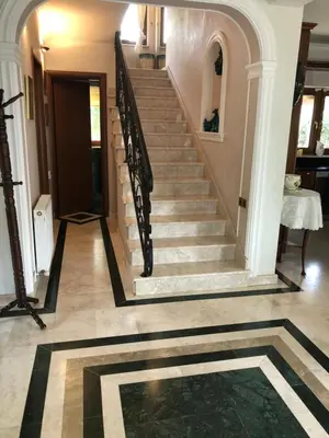 a hallway with a staircase in a house at Villa Natalia in Ayia Napa