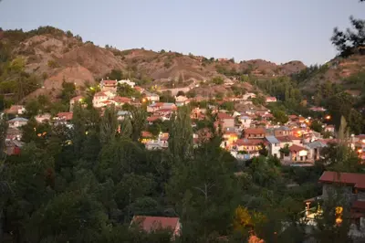 a town on top of a hill with houses at Melissonas Villas in Phini