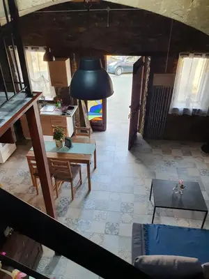 an overhead view of a living room with a table at Petradaki House in Arakapas