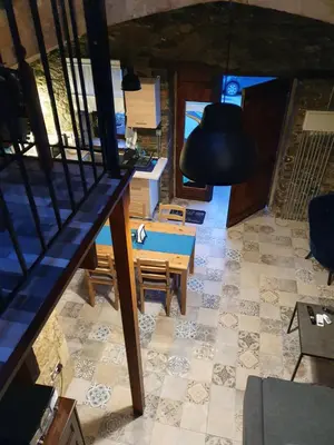 an overhead view of a room with a table and chairs at Petradaki House in Arakapas