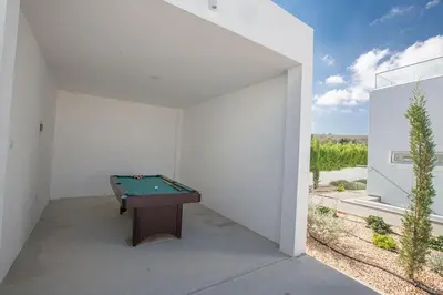 a white room with a pool table in it at Villa Ochosto Loux - Fabulous 5 Bedroom Protaras Villa With Private Pool in Protaras