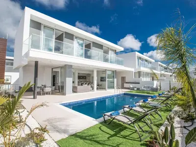 an image of a house with a swimming pool at Villa Olive Sun, Beautiful, Contemporary 3Bdr Villa With Private Pool in Protaras