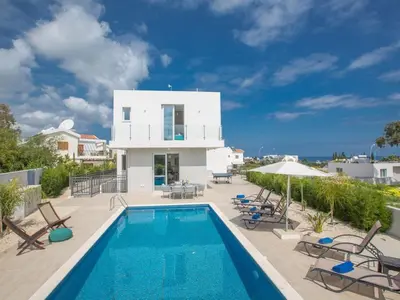 a villa with a swimming pool and a house at Villa Protaras Gold,Brand New, Luxury 5Bdr Protaras Villa With Private Pool in Protaras