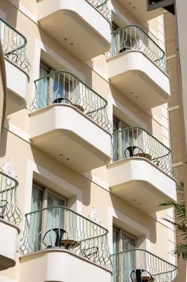 a facade of a building with balconies at Leonardo Boutique Hotel Larnaca in Larnaka