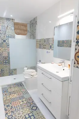 a white bathroom with a sink and a toilet at LIMASSOL AKROTIRI BEACH VINE COTTAGE a in Limassol