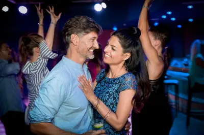 a man and a woman dancing on a dance floor at ROBINSON Cyprus in Alaminos