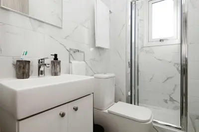 a bathroom with a toilet and a sink and a shower at Villa Napa View in Ayia Napa