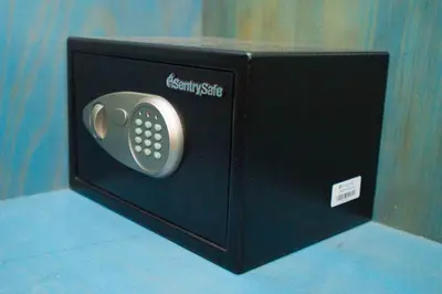 a black microwave with a remote control in it at TSANotel in Limassol