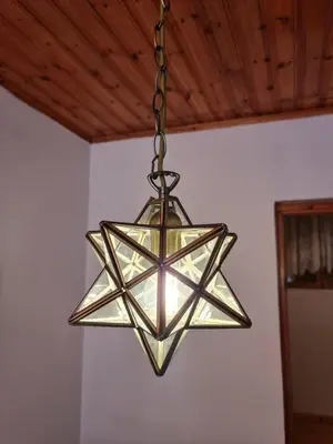 a metal chandelier hanging from a ceiling at Kassandras place in Omodos village in Omodos