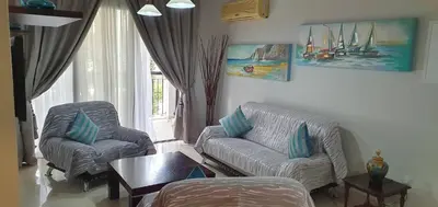 a living room with a couch and chairs and a table at Casa Di Gio in Tersephanou