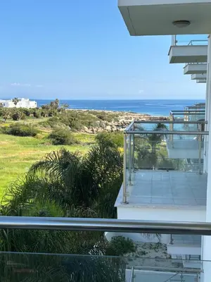 a view of the ocean from the balcony of a house at A209 Coralli Spa, Cyprus - Med View Studio in Protaras
