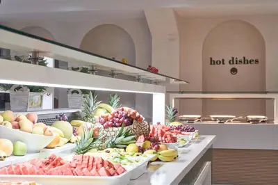 a bunch of fruits and vegetables on a counter in a kitchen at Atlantica Aeneas Resort in Ayia Napa