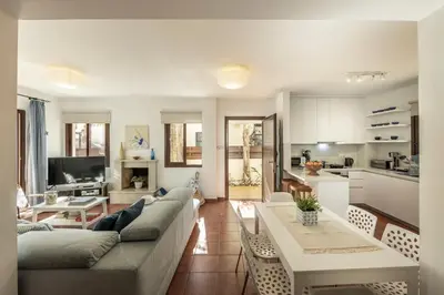 a living room with a couch and a table at Villa Ionion 27 in Ayia Napa